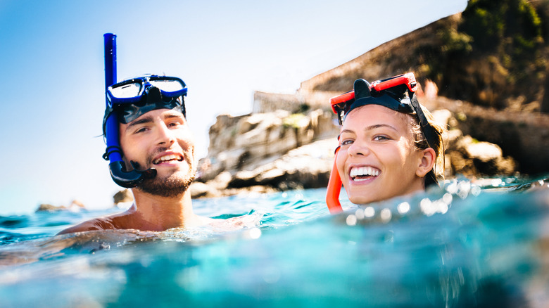 snorkeling couple